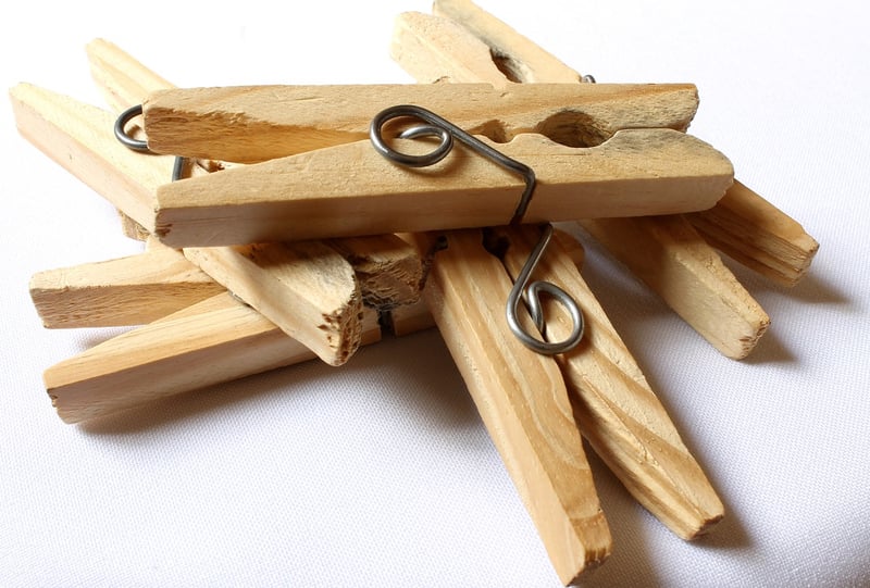 Clothespin holding a nail